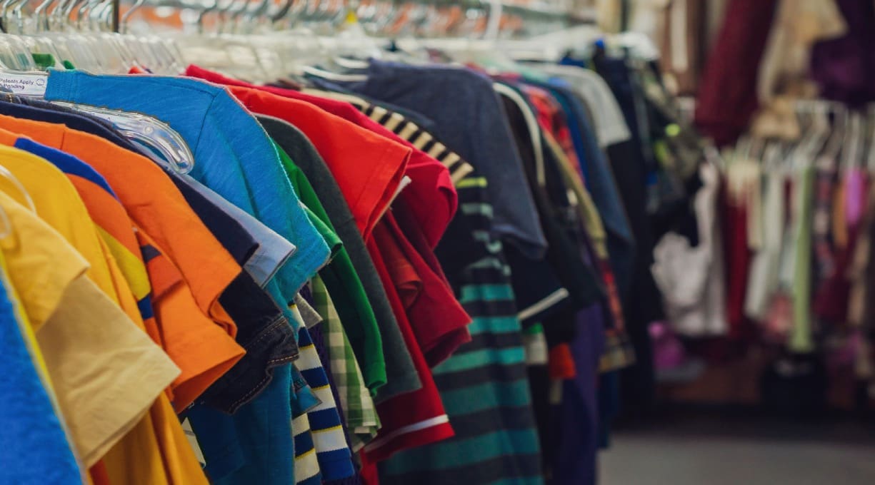 Clothes rail of clothes in a second-hand shop