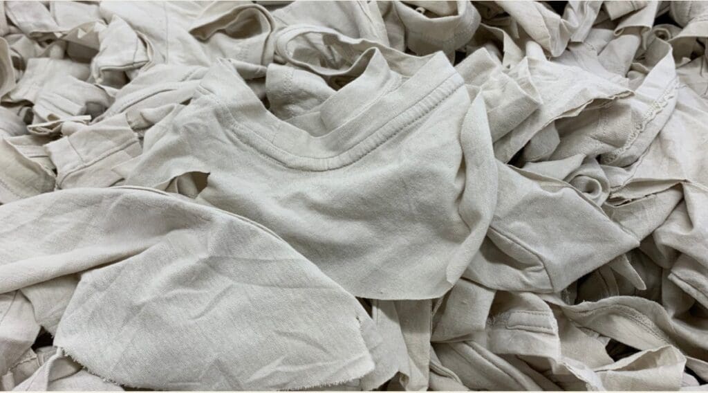 bundle of t shirts in a pile