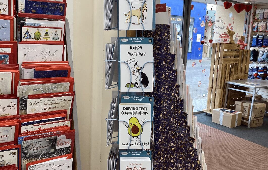 A POS display unit showcases Bare Cards' collection inside a greeting cards shop.