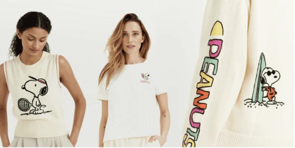two women model a new range of clothing featuring Peanuts' Snoopy