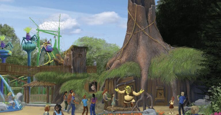 image of Shrek in his woodland home with people visiting the Universal experience.
