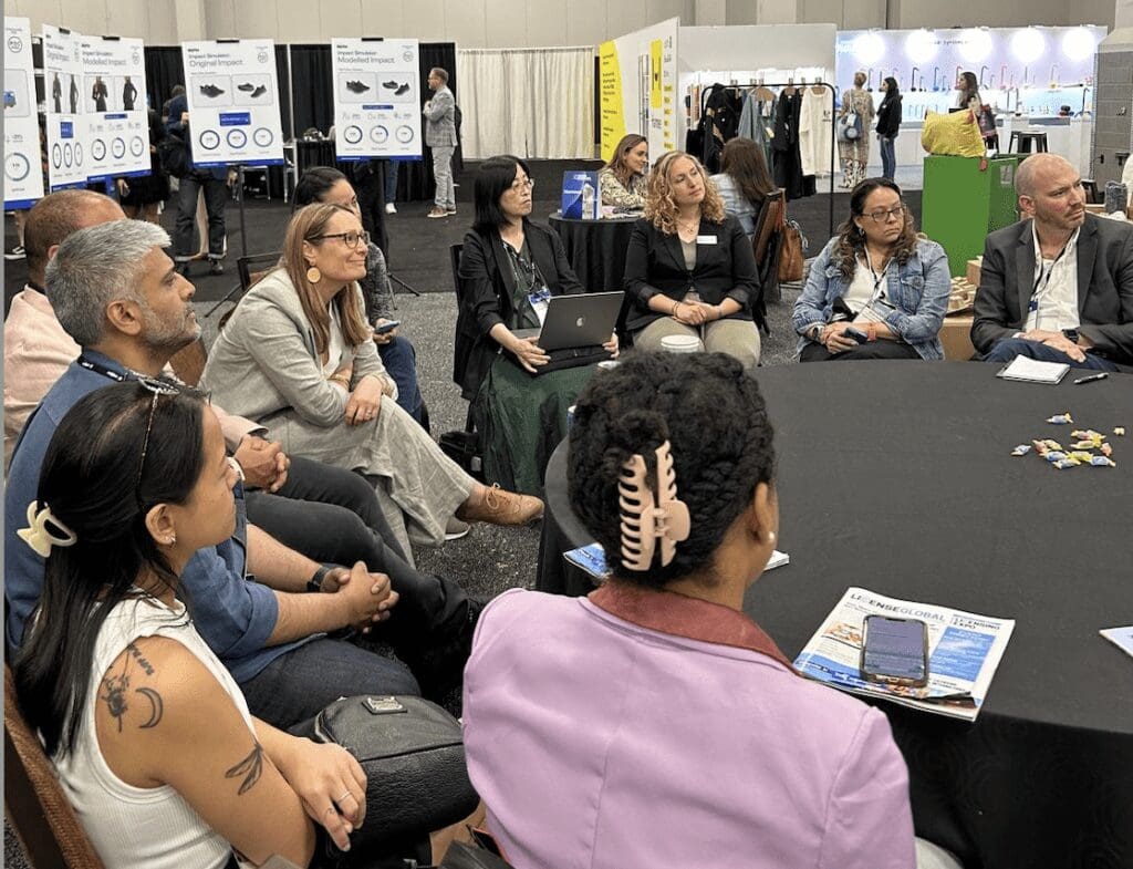 Carbon roundtable session at Licensing Expo set to a backdrop of the Product Impact Scoring platform, Dayrize.