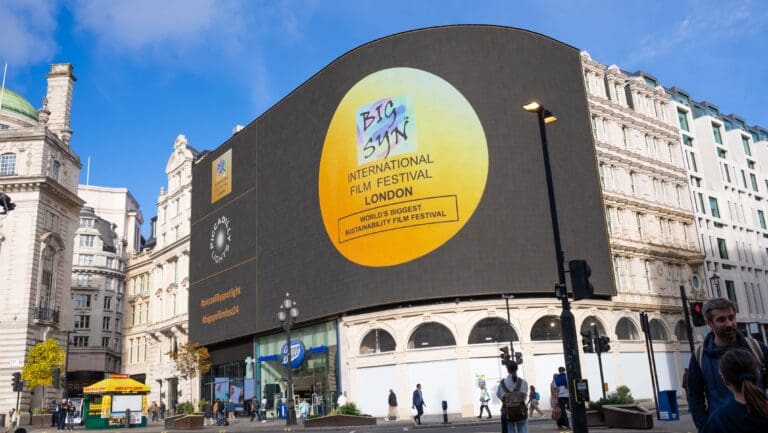 Digital billboard on building advertising the Big Syn Film Festival