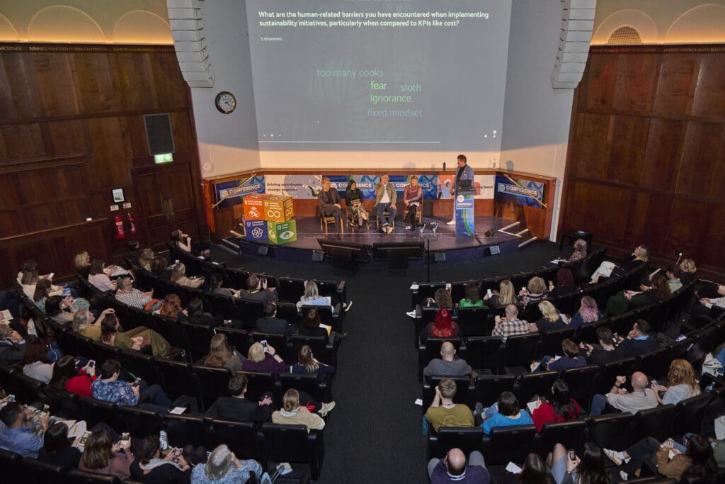 Overhead of the auditorium during a panel discussion.