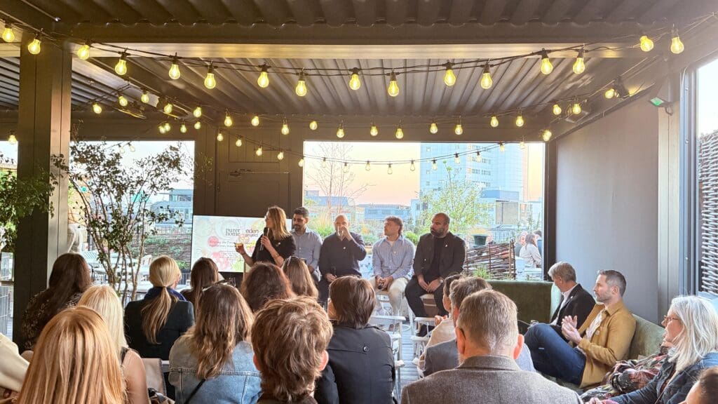 A panel sitting in front of an audience
