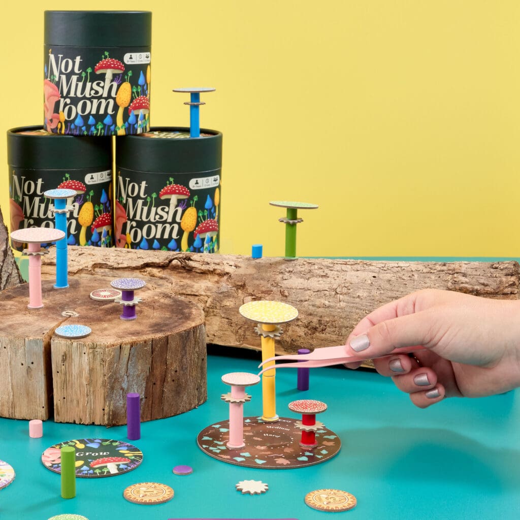 G9048 Not Mushroom Game Lifestyle with Logs and Hands